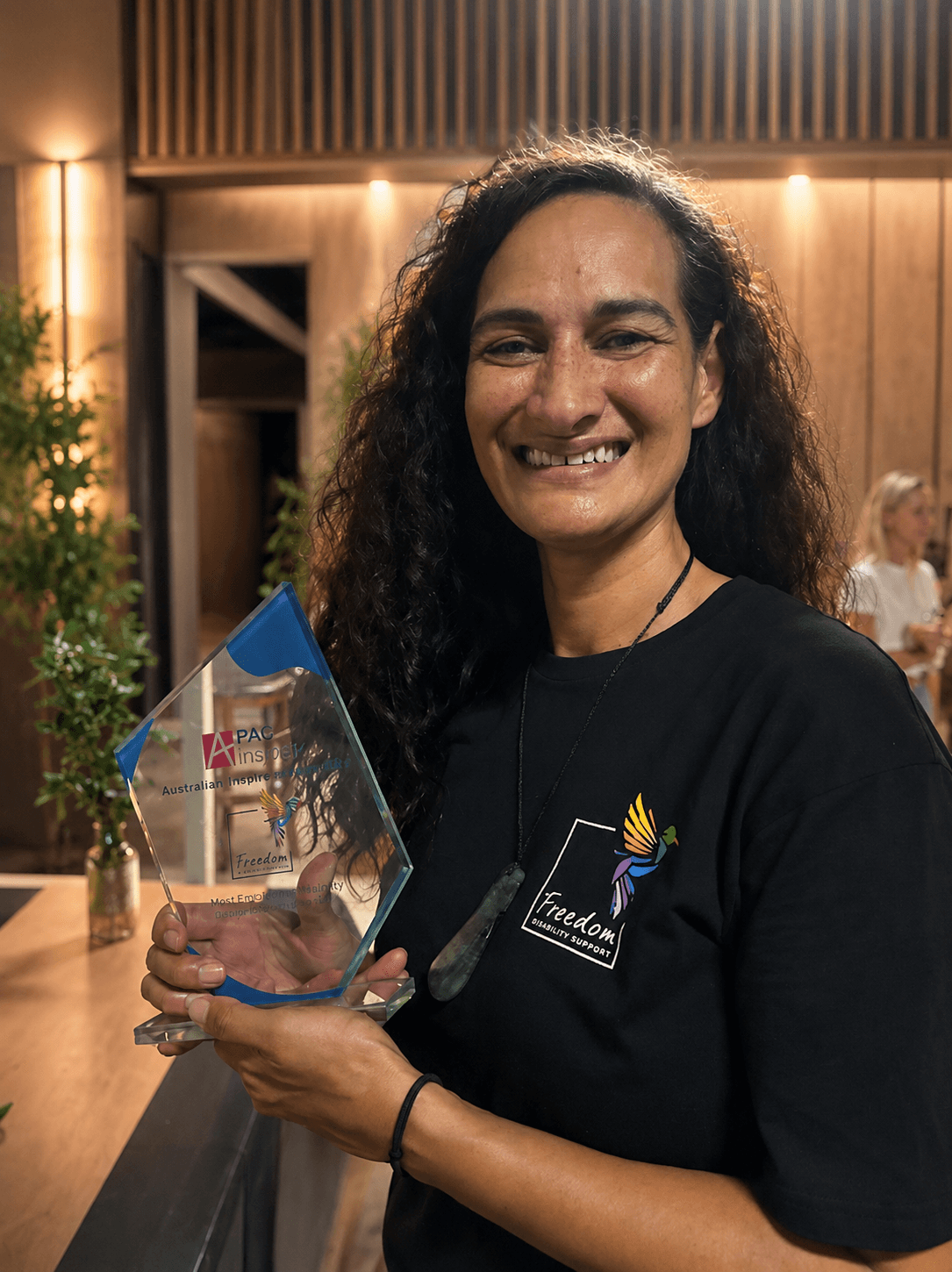 Freedom founder holding the APAC Insider award trophy