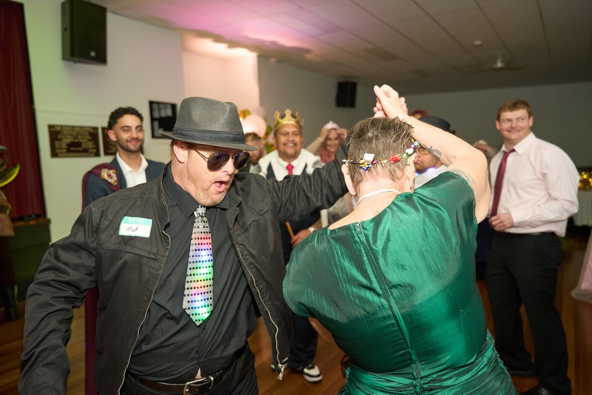 Freedom members dancing together on the floor at the Freedom Ball